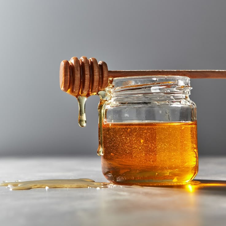 Bajo Honey glass jar filled with golden natural honey